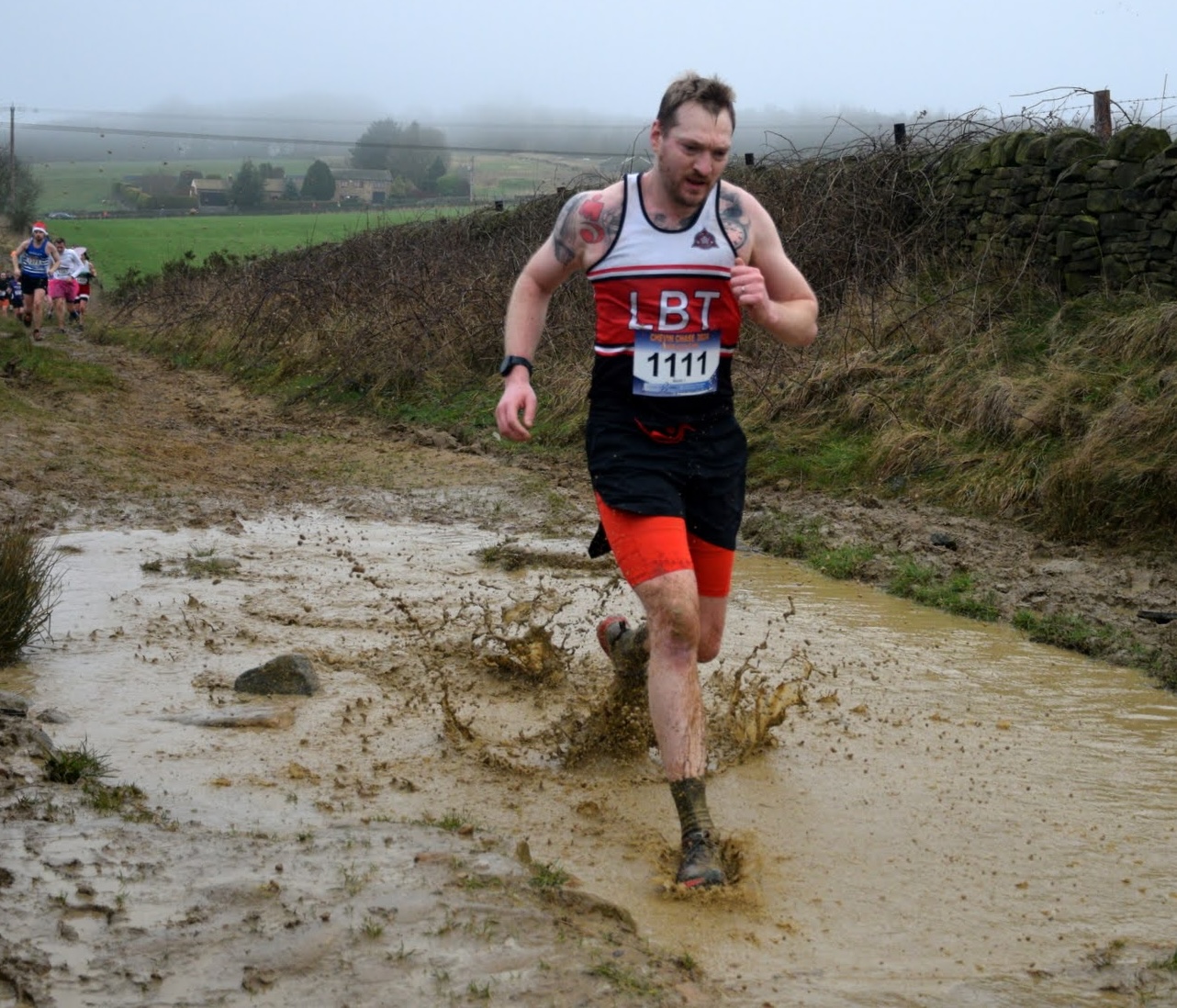 Running through a deep muddy puddle